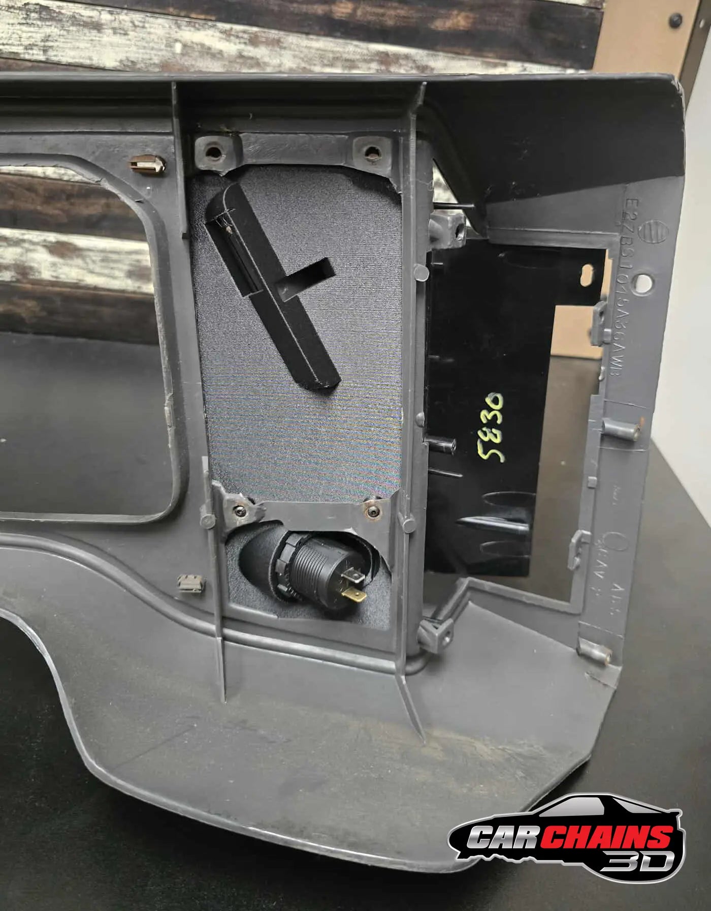 3D-printed ABS center console for 1979-1986 Ford Mustang Fox Body with Holley EFI 3.5-inch Terminator X Sniper screen mount and integrated phone charger.