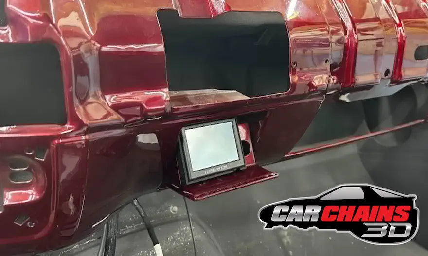Upgrade your 1973 to 1987 C10 and K10 with the perfect solution for mounting your Holley 3.5" screen. Designed by Square Root Fabrication and offered through CarChains3d, this ashtray mount provides a seamless integration for LS swapped trucks, placing the screen conveniently in the ashtray without the need for cutting or modifications.