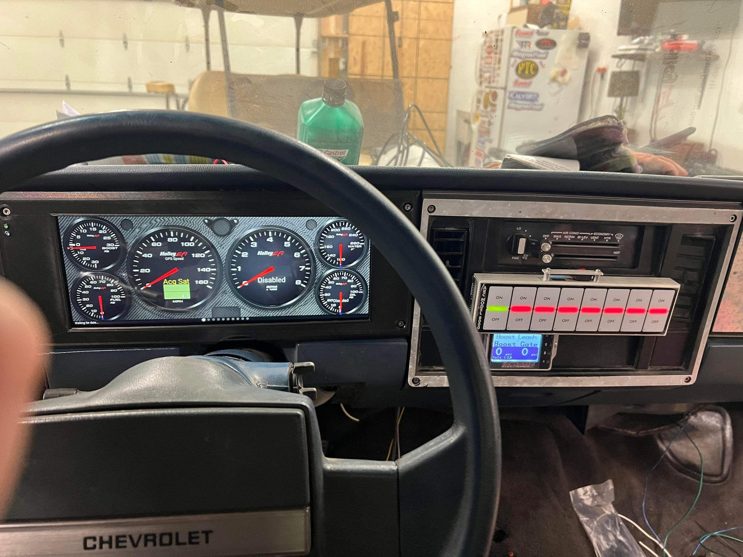 3D printed digital dash bezel for 1982-1985 Chevrolet S10 Blazer Jimmy Sonoma by CarChains3D displaying a Holley 12.3" screen