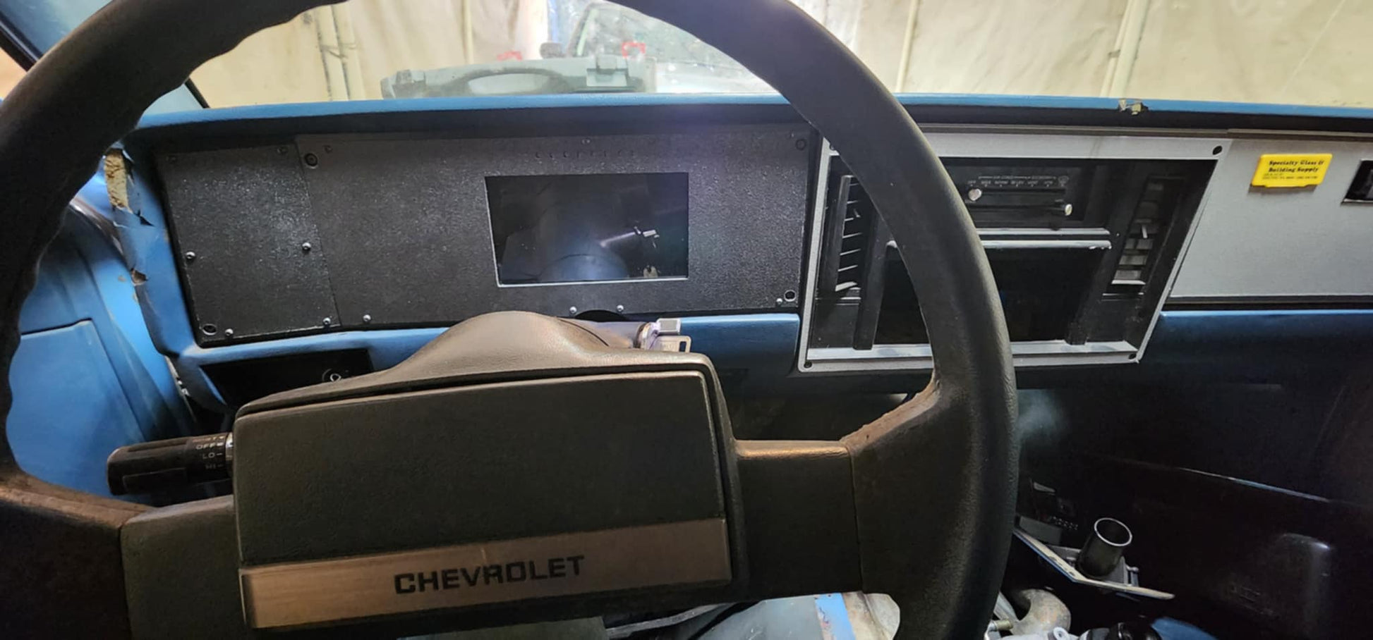 3D printed digital dash bezel for 1982-1985 Chevrolet S10 Blazer Jimmy Sonoma by CarChains3D displaying a Holley 6.8" screen